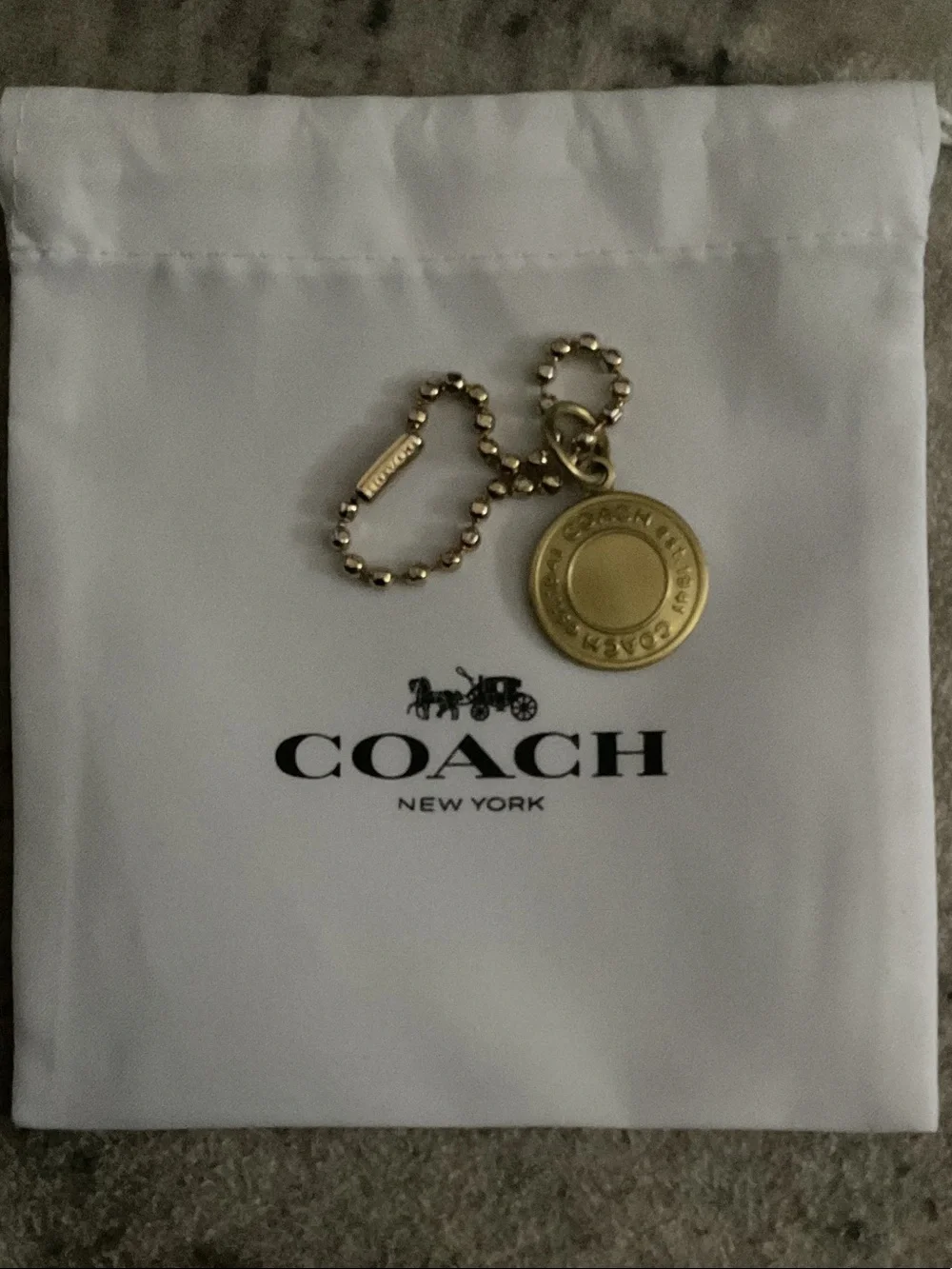 COACH Gold-Tone Round Token Charm with coach ball chain